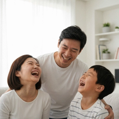 A family (mother, father, child) laughing together, clean house background, no text, no words, no typography, no labels, clean image
